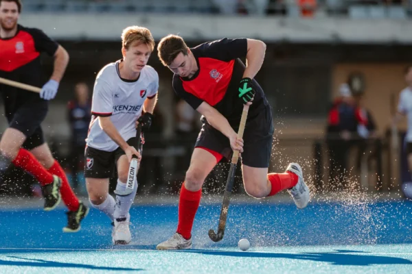Men playing hockey